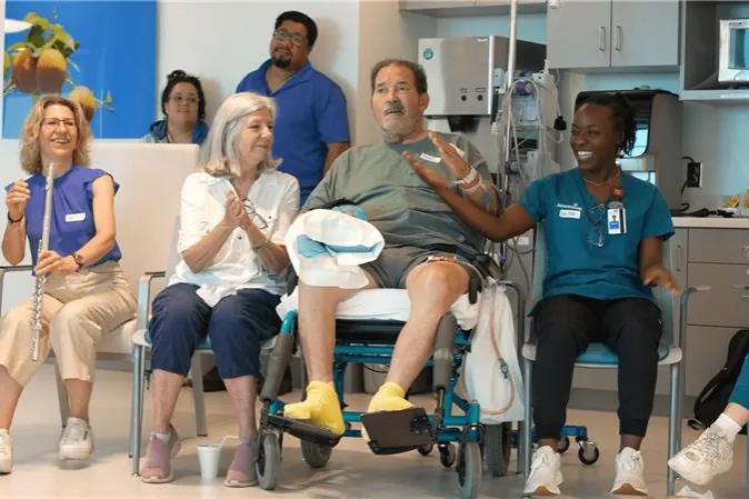 AdventHealth patient and family with staff members