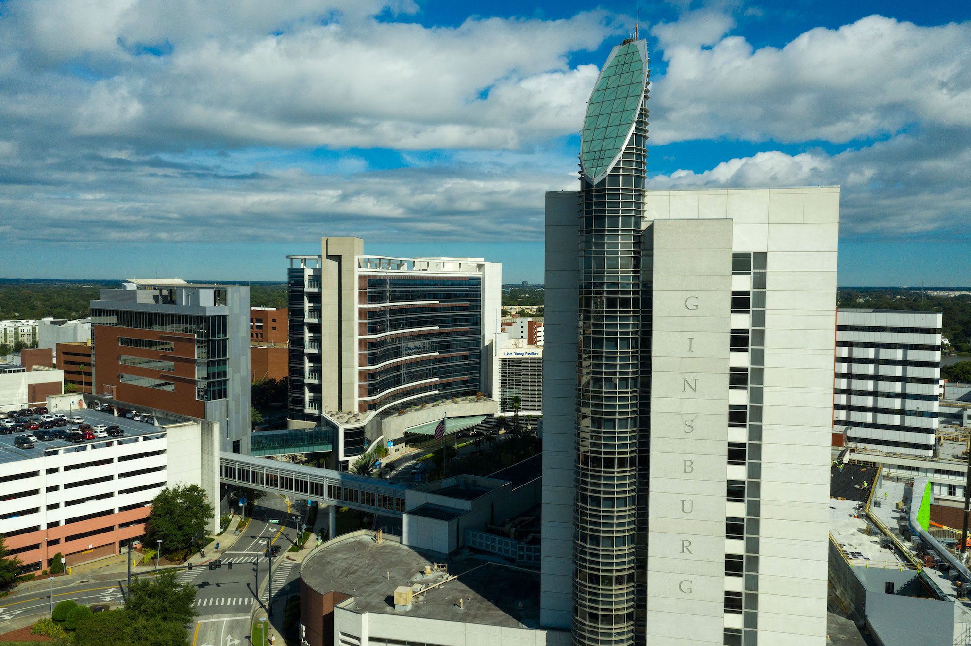 A front and panoramic view of the AdventHealth for Women building