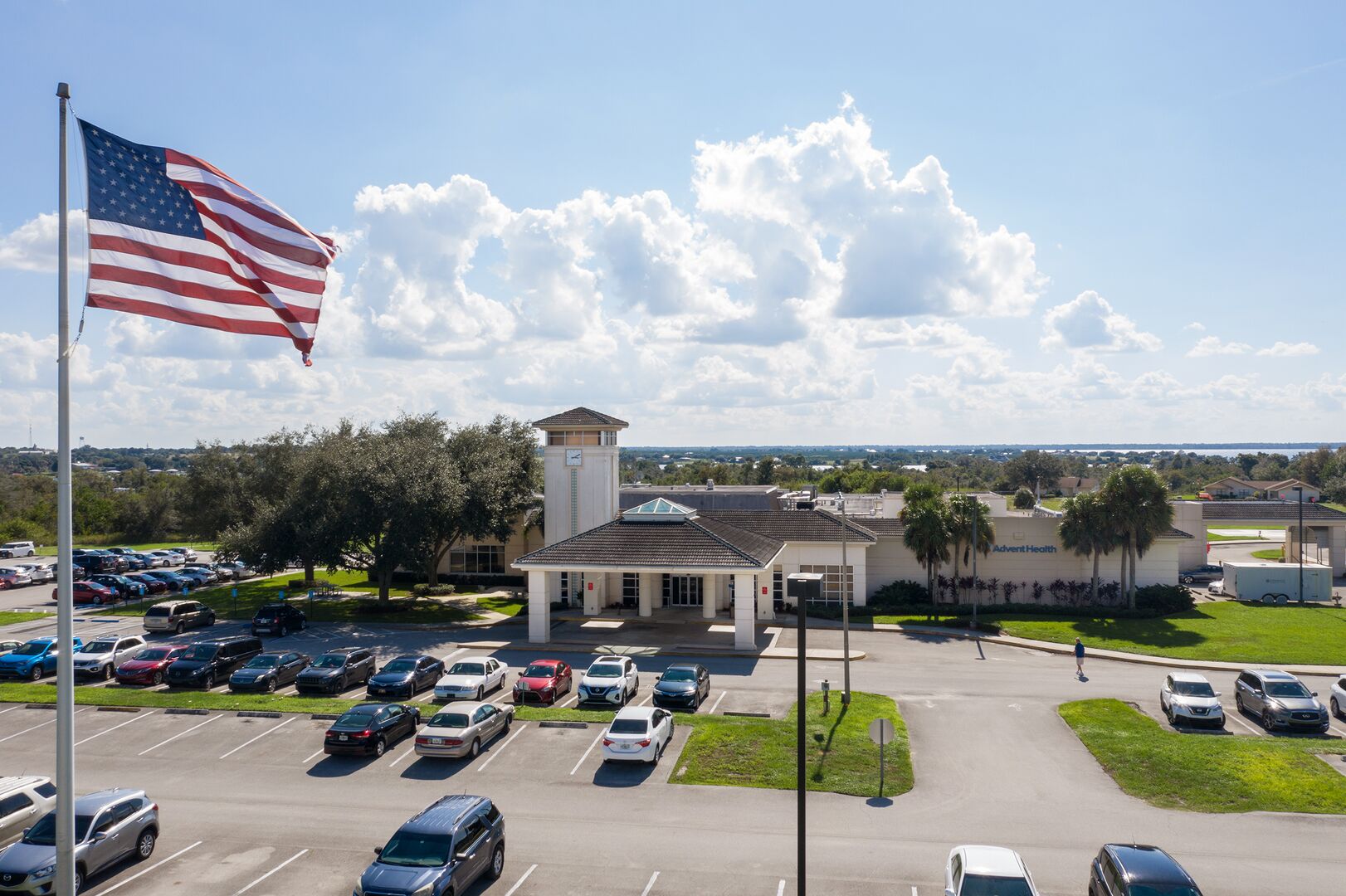 Aerial daytime view of AdventHealth Lake Placid hospital campus.
