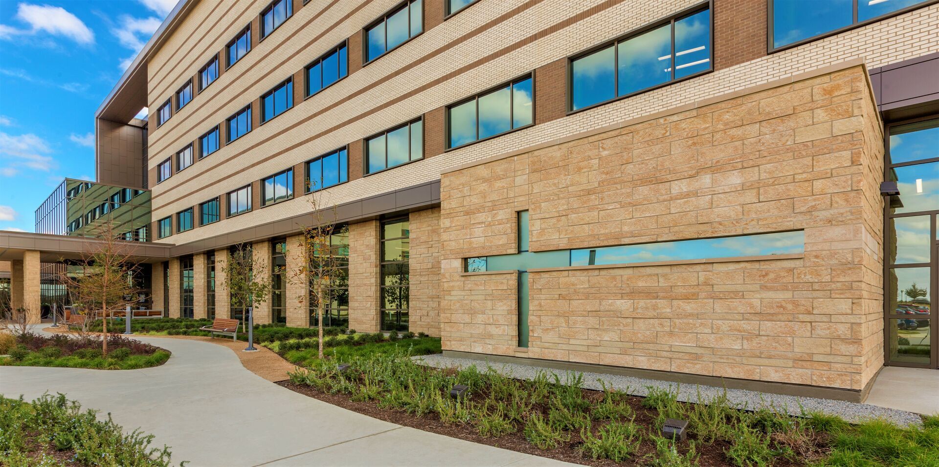 Exterior of AdventHealth / Texas Health Mansfield hospital building.
