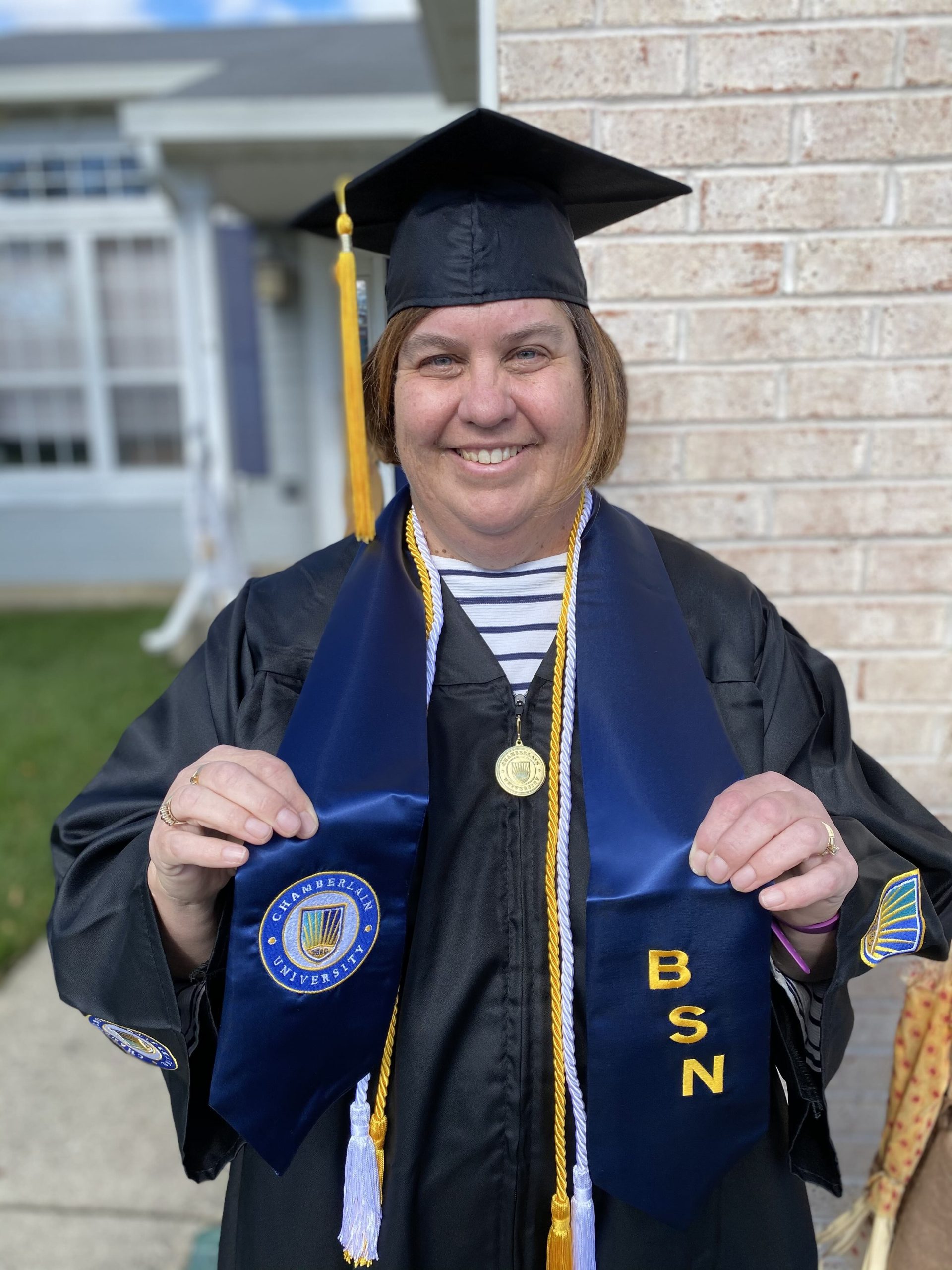 Ann Pettey in graduation robes