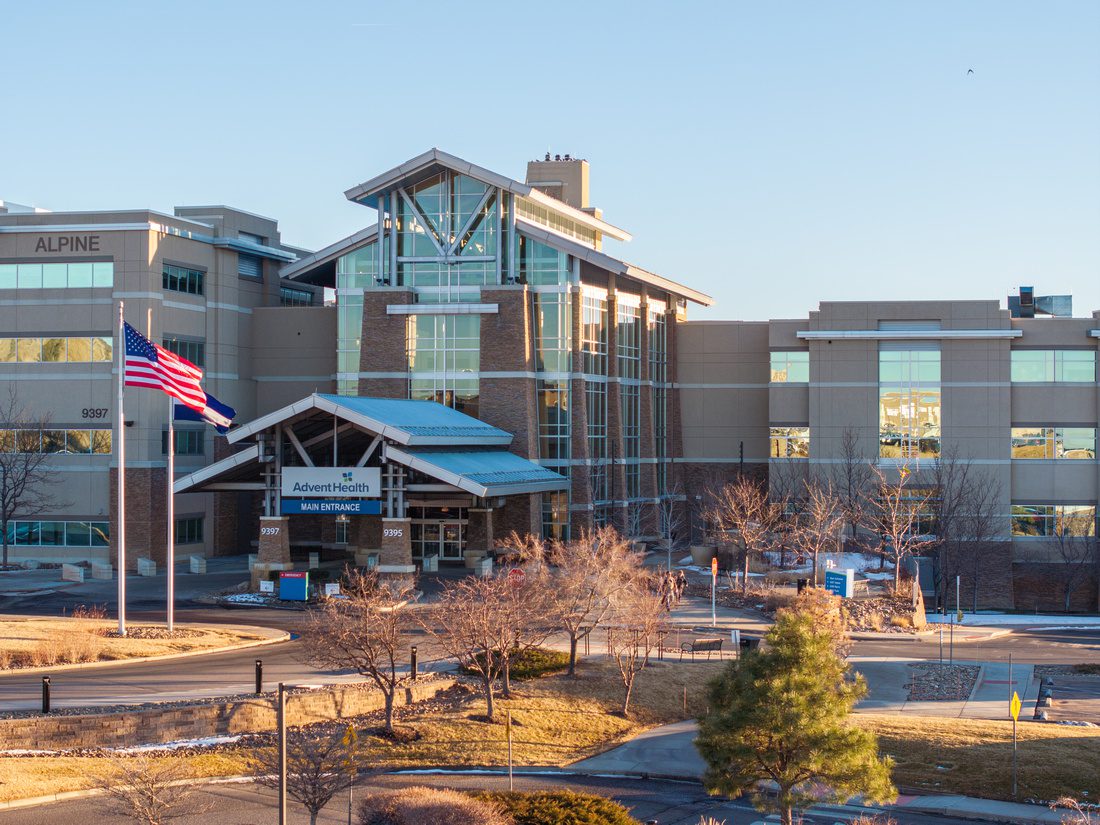 Exterior view of AdventHealth Parker hospital main entrance.