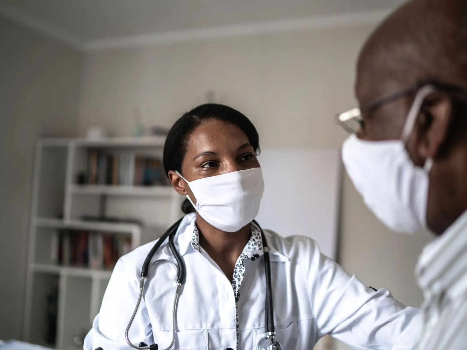 A man visiting his doctor.